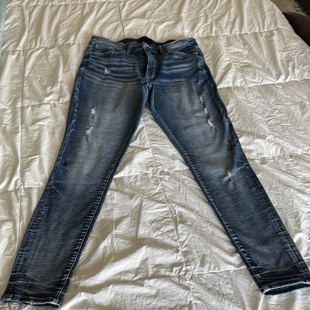 Buckle black skinny jeans 32